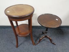An Edwardian inlaid mahogany two tier plant stand together with a further mahogany wine table.