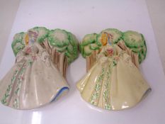 A pair of Clarice Cliff Newport pottery china wall pockets.