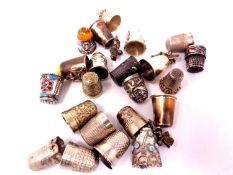 A quantity of silver thimbles and five silver plated thimbles including enamelled examples.
