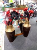 A mahogany bevel edged mirror together with two contemporary vases containing flowers.