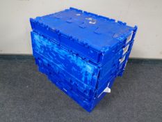 Seven plastic tote crates.