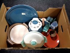 A box of miscellaneous Poole pottery dinner wares.