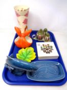 A tray containing Carlton ware trinket box, Poole pottery including a dolphin figure,