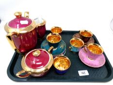 A tray of Czechoslovakian gilt coffee china.