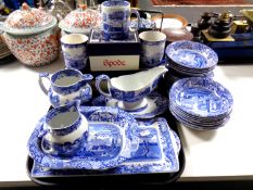 A Spode Italian 32 piece blue and white china set including four boxed mugs.