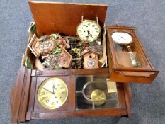 A box containing cuckoo clock parts,