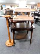A 20th century turnover top two tier tea trolley together with two dralon upholstered stools and a