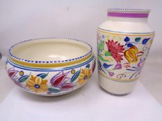 A Poole pottery fruit bowl (diameter 24cm) together with a similar Poole vase.