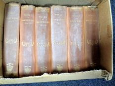 Six volumes of The Works of Robert Burns.