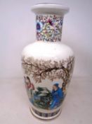 An oriental style baluster vase together with a Spanish porcelain vase.