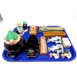 A tray containing Tom & Jerry china figures, Wade Andy Capp toast rack, a pair of sifters,