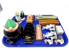 A tray containing Tom & Jerry china figures, Wade Andy Capp toast rack, a pair of sifters,