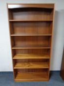 A set of 20th century teak open bookshelves (width 90cm).