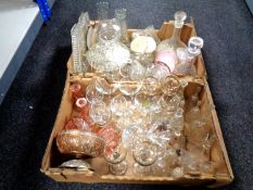 Two boxes containing 20th century glassware including decanters, wine glasses,
