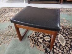 A 20th century teak G Plan E. Gomme dressing table stool.