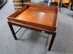 A 19th century mahogany butler's table with lift off tray (width 75cm).
