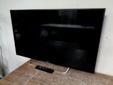 A Sony 42" LED TV with lead and remote.