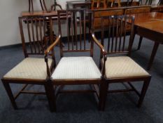 A set of six 19th century mahogany rail back dining chairs, two carvers and four singles.