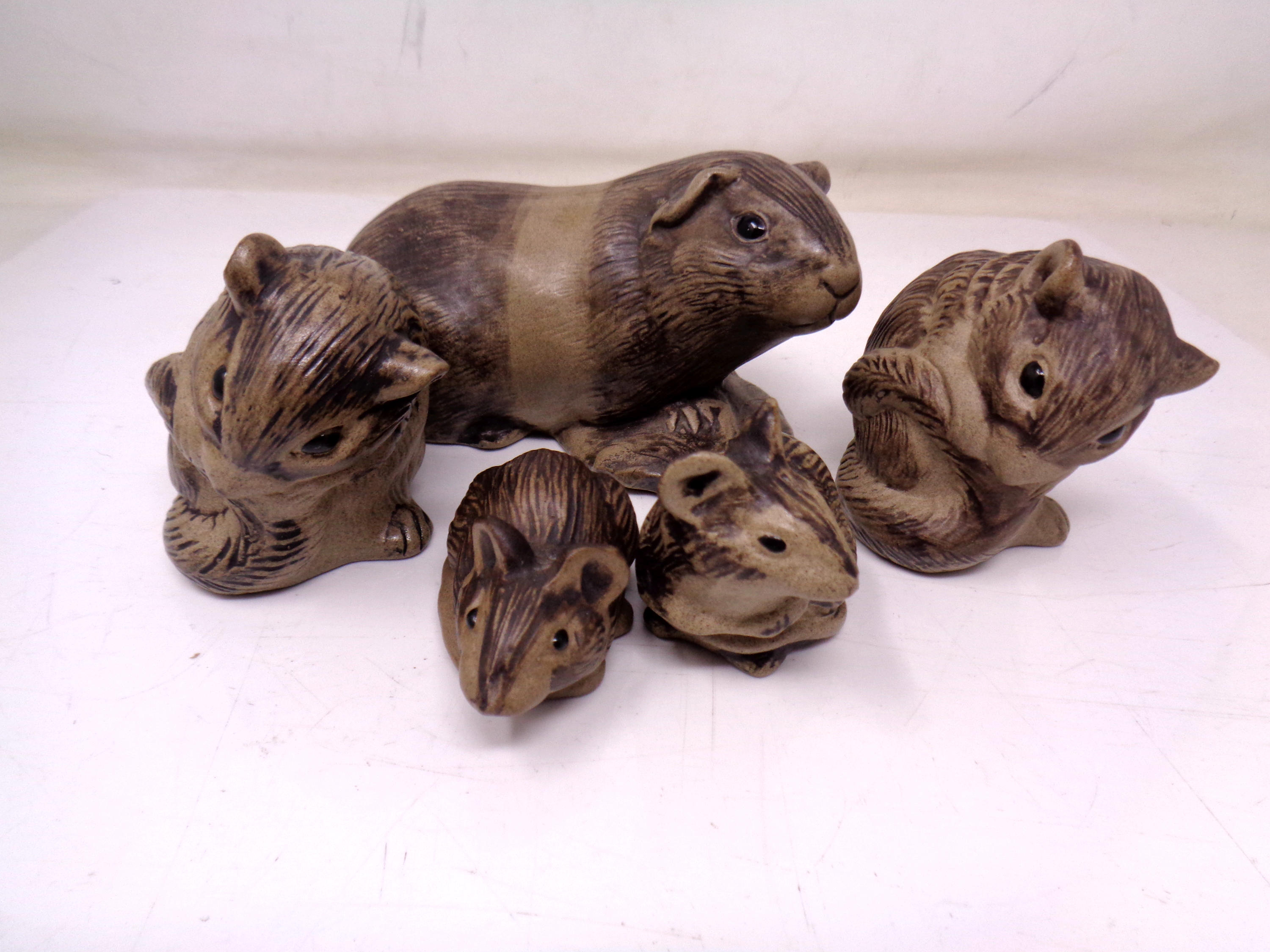 A group of Poole china animal ornaments including guinea pig, chipmunks and mice (tallest 7cm).