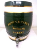 A Brown & Pank's china sherry barrel with tap.