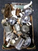 A box containing stainless steel and plated wares including a tea set, pewter tankard,