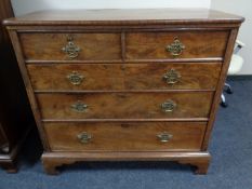 A George III mahogany two-over-three five drawer chest.