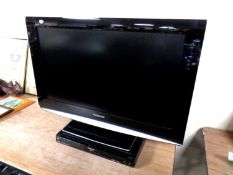 A Panasonic Viera 32" LCD TV with remote together with a Panasonic Diga DMR-EX769 DVD recorder with