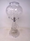 A cut glass lead crystal table lamp with shade (height 46cm).