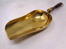 A brass coal shovel
