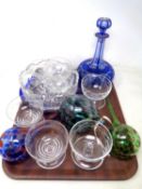 A tray containing assorted glassware including a Bohemian crystal two-tone decanter, glass bauble,