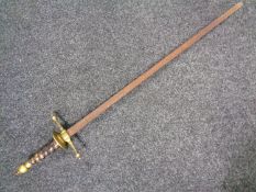A brass hilted sword.