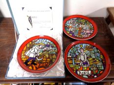 Three Poole pottery medieval calendar plates.