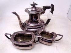 A three piece Walker & Hall silver plated tea set.