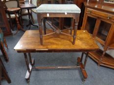 A 19th century rosewood occasional table with under stretcher on brass castors together with a