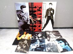 Nine Elvis Presley wall canvasses.
