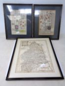 A framed black and white map of Northumberland together with two further hand coloured road maps of