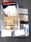 A box containing albums containing world stamps, First Day covers, loose stamps.
