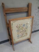 An Edwardian tapestry firescreen/occasional table together with a rustic folding clothes airer.