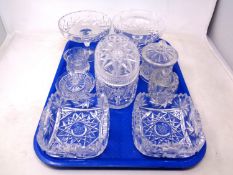 A tray containing assorted cut glass lead crystal including lidded jar, preserve pots, comport,