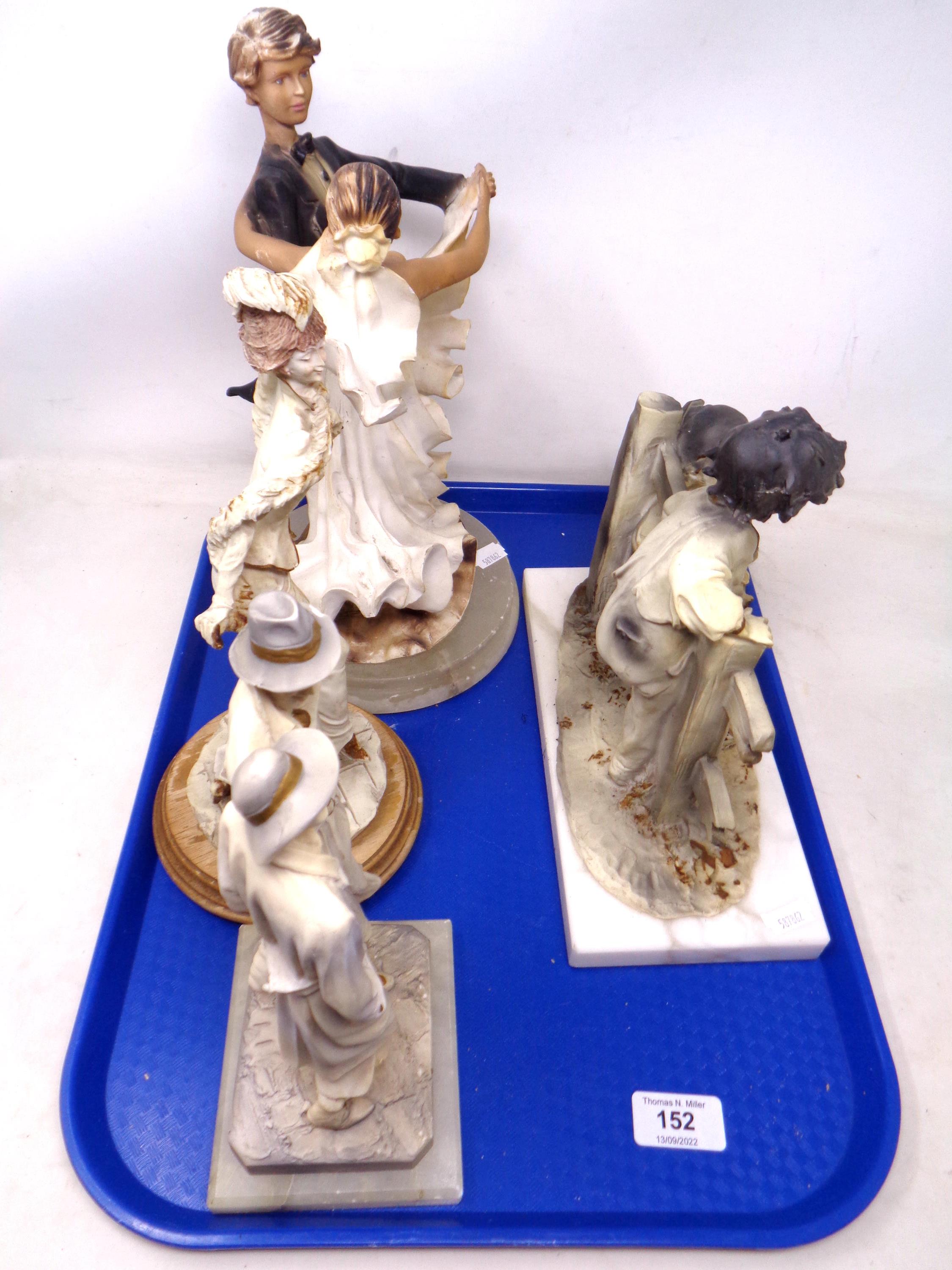 A tray of four continental figures on marble, onyx and wooden plinths.