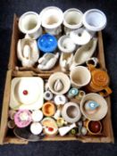 Two boxes containing miscellaneous china including swan ornaments, urns,