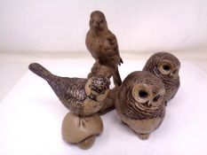 A group of four Poole china bird ornaments including a pair of owls (tallest 14.