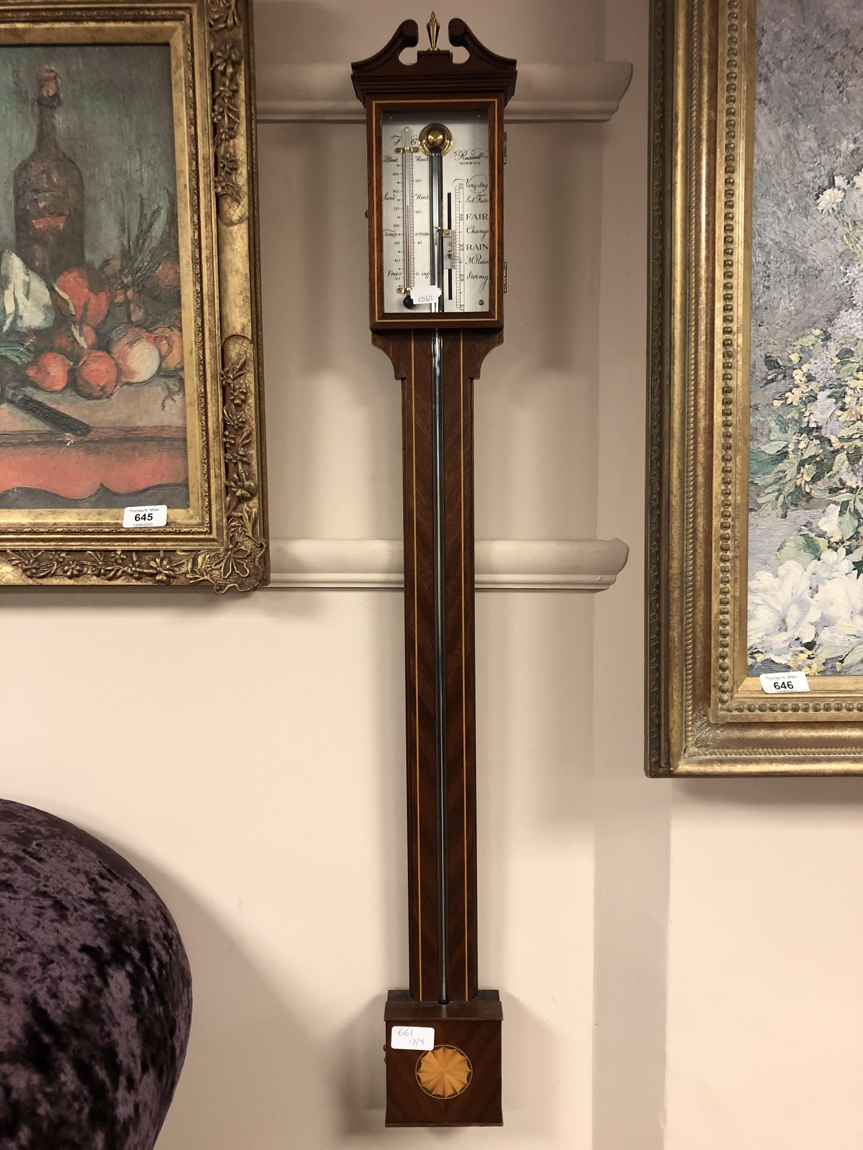 A reproduction stick barometer by Russell of Norwich