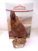 A Royal Doulton Matthew Gloag & Son ltd. Famous Grouse scotch whisky decanter, sealed with contents.