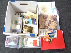 A box containing a large quantity of 20th century postcards,