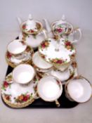 A tray of 24 pieces of Royal Albert Old Country Roses tea china.