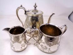 A three piece silver plated tea set.