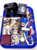 A tray containing Bench sunglasses, assorted lady's and gent's wristwatches, costume jewellery,