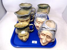 A tray of six Kingston pottery character jugs.
