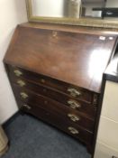 A Georgian mahogany fall front bureau with four drawers